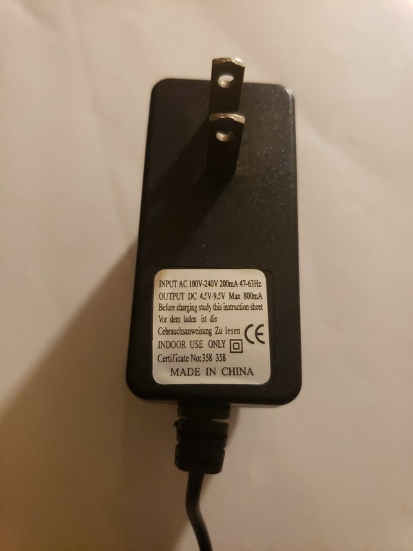 AC/DC Power Adapter: Input 100V-240V 200MA 4.7-63Hz Output 4.5V-9.5V Max 800mA