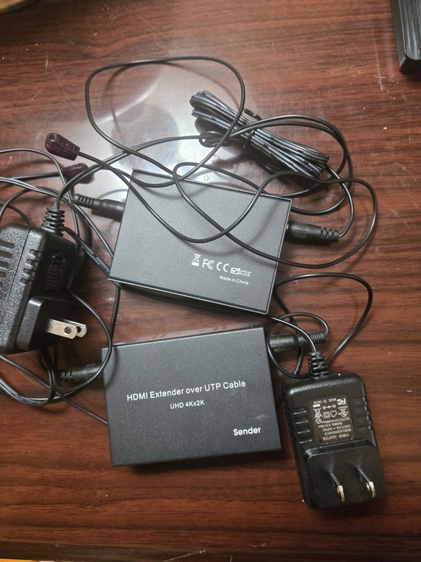 HDMI extenmder over UTP with power cord…4